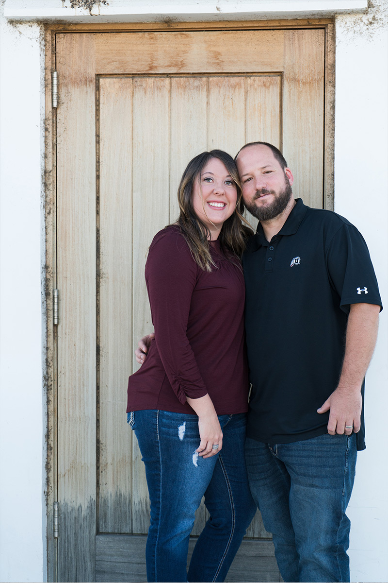 humbirdphoto - Photo of couple next to a rustic door
