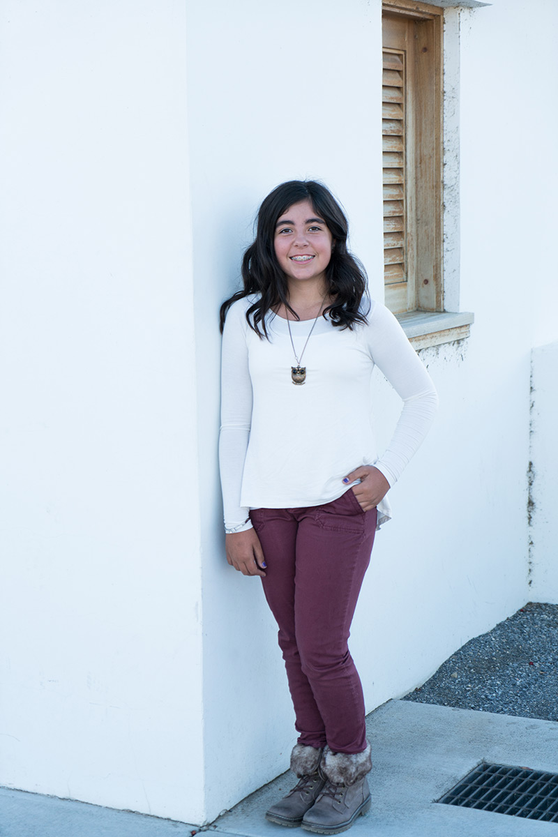 humbirdphoto - Photo of a teenage girl next to a white shed