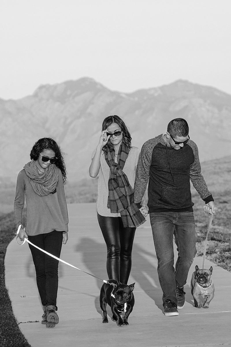 humbirdphoto - Photo of a family walking thier two dogs